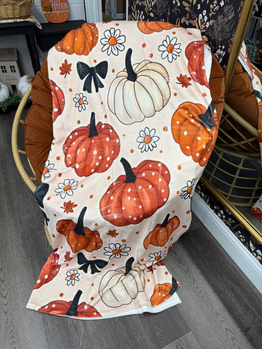 Pumpkin and bow throw blanket