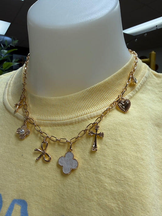 Gold and white charm necklace