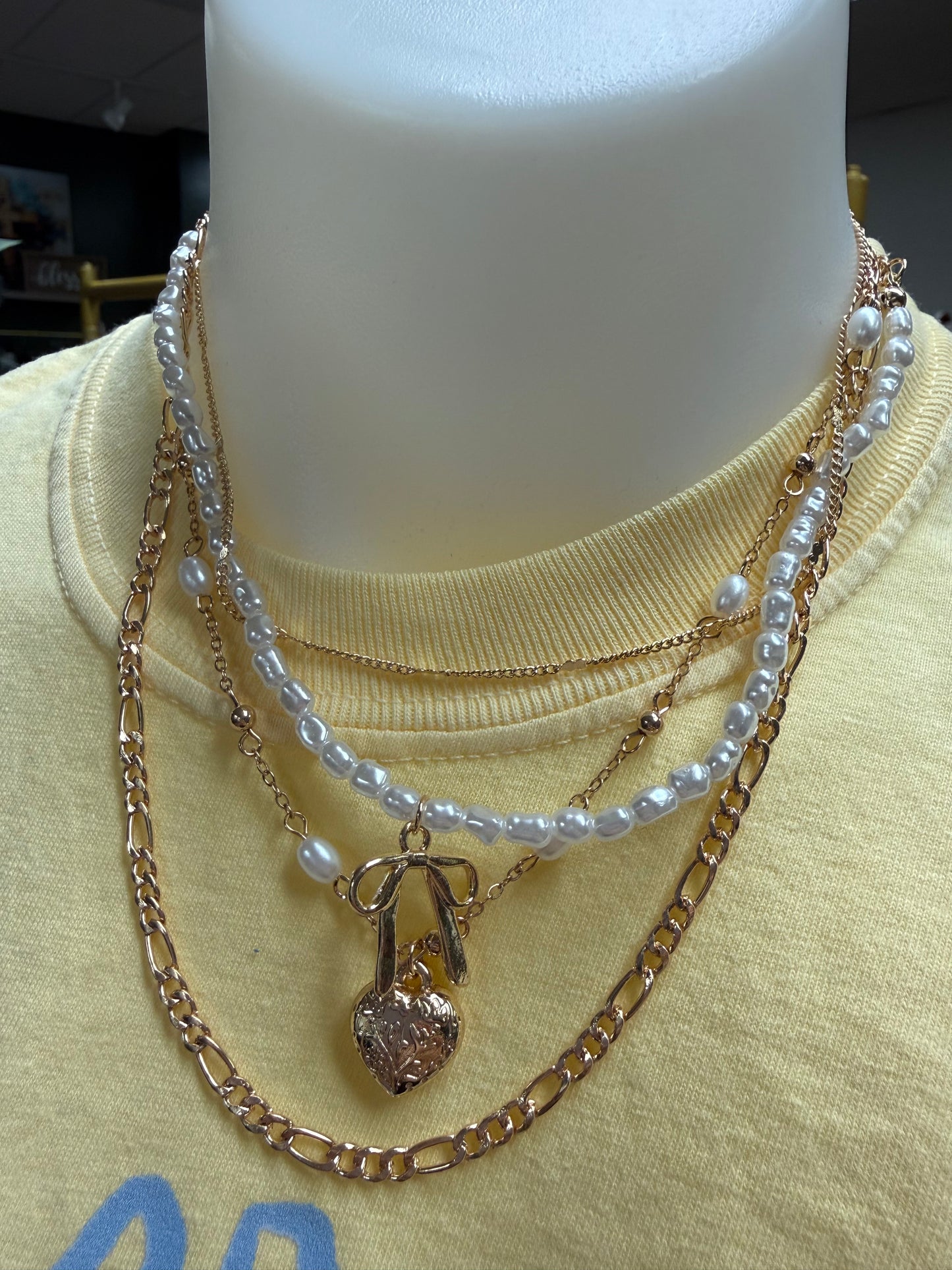 Bow and pear layered necklace